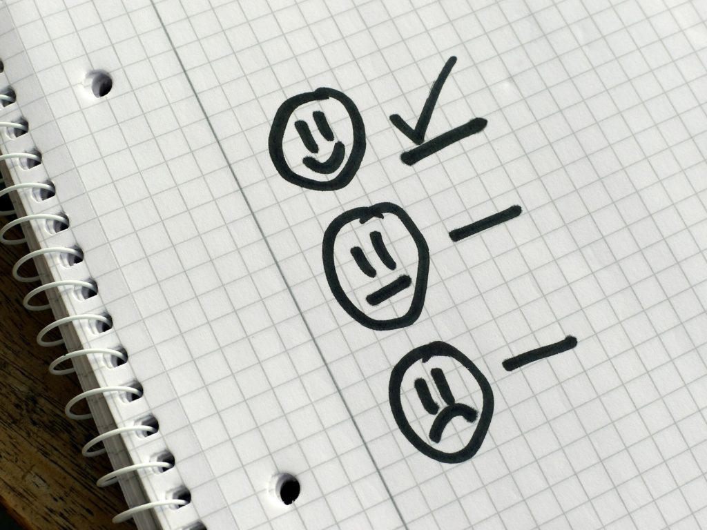 checkmark next to smiley face