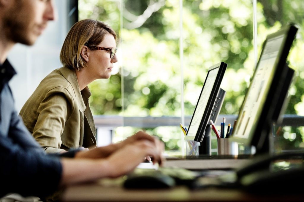woman staring at computer screen